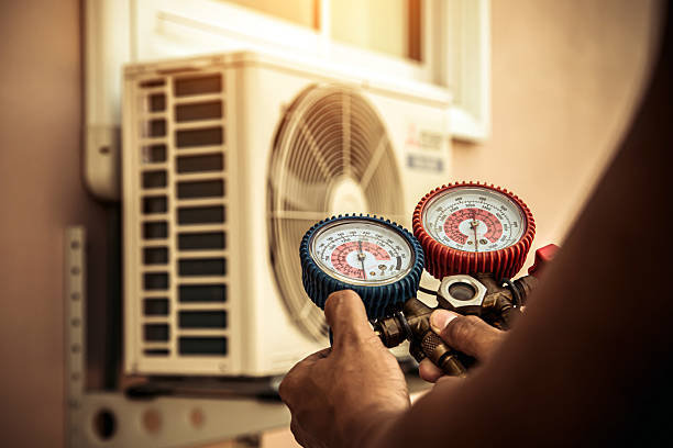 Professional Emergency Hvac technician working in Four Oaks, NC